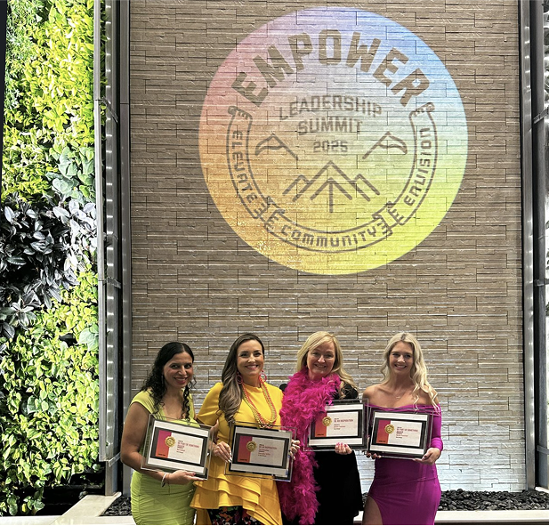 Graphic of a typography specimen showing the alphabet and numerals on top of a dark gray background.