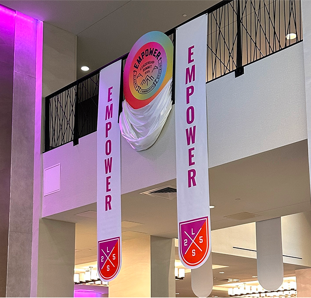 Graphic depicting a hexagonal cropped photo of an interior room design with grid lines along its borders.