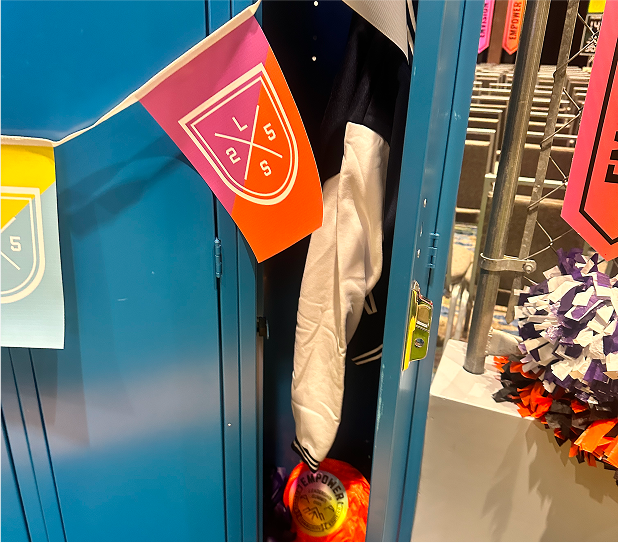 Graphic depicting a hexagonal cropped photo of an interior room design with grid lines along its borders.